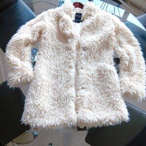Luxurious, light and fluffy ivory faux fur jacket with satin lining and pockets